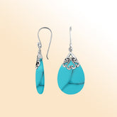 Sterling silver turquoise teardrop earrings with scroll accent for women